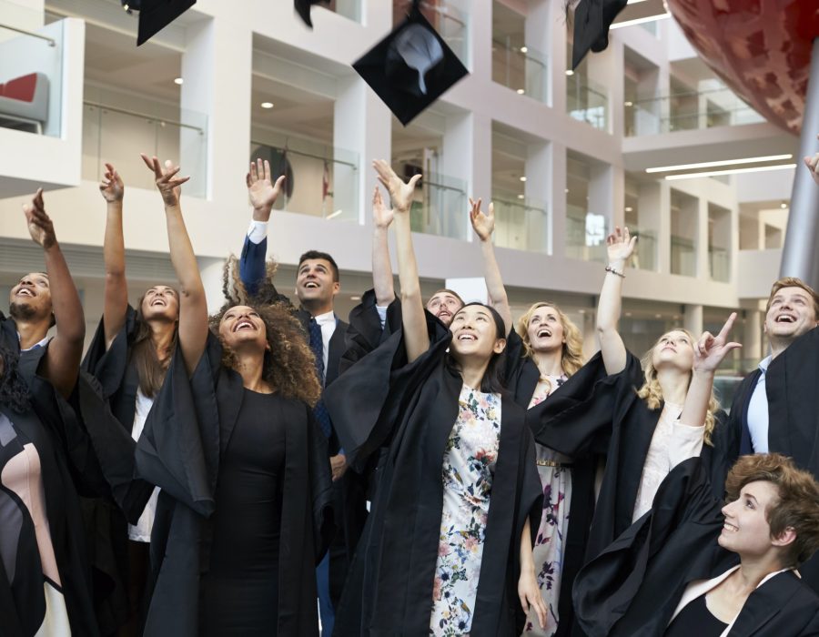 university-students-throwing-their-caps-in-the-air-on-graduation-day.jpg